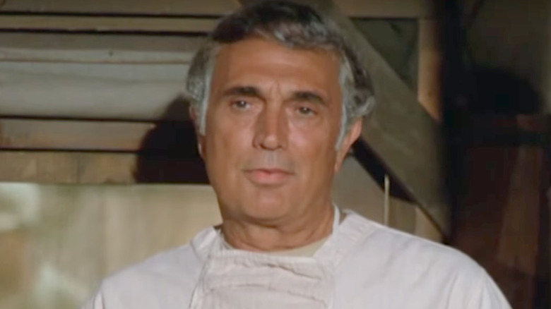 Robert Alda playing a doctor