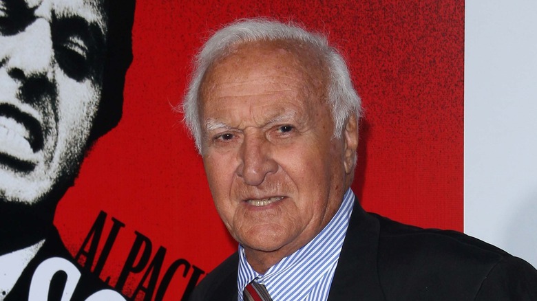 Robert Loggia, posing