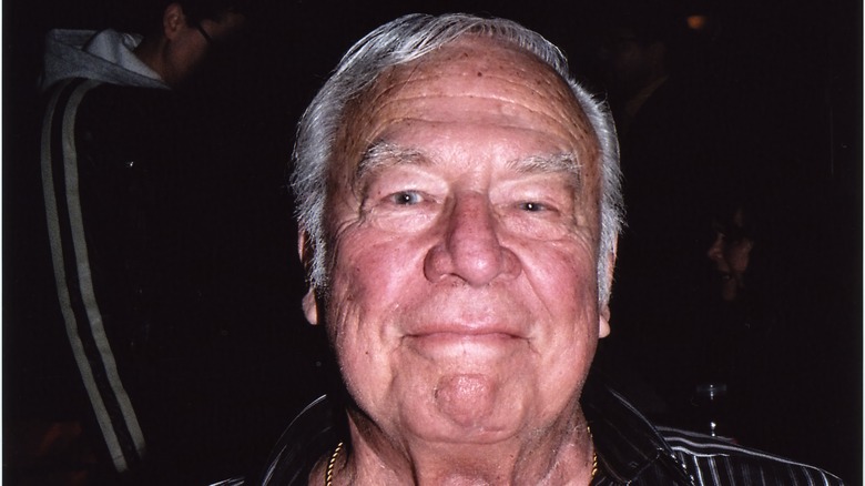 George Kennedy grinning