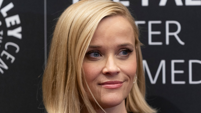 Reese Witherspoon half smiling