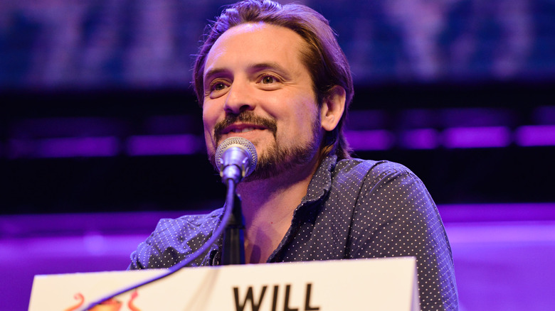 Will Friedle smiles