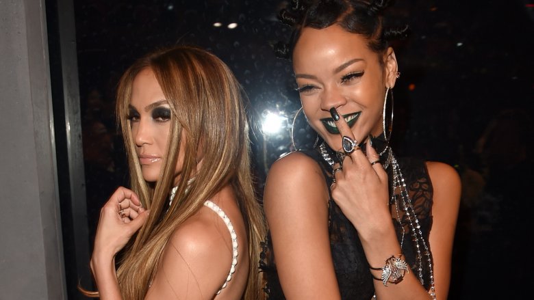 Jennifer Lopez and Rihanna both posing