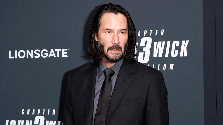 Keanu Reeves posing at "John Wick Chapter 3" premiere