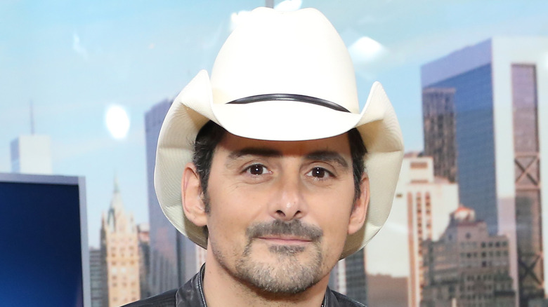 Brad Paisley wearing a white cowboy hat