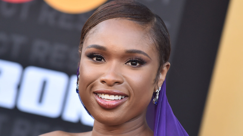 Jennifer Hudson wearing purple, smiling