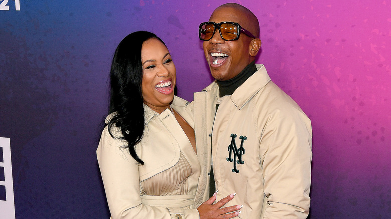 Ja Rule laughing with Aisha Atkins