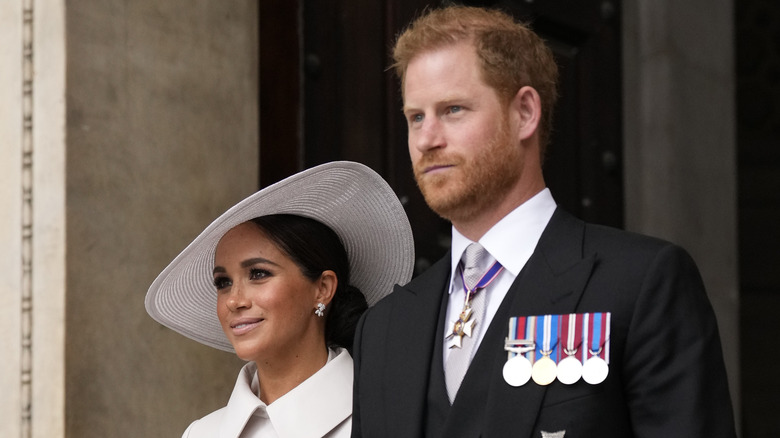 Prince Harry posing with Meghan Markle