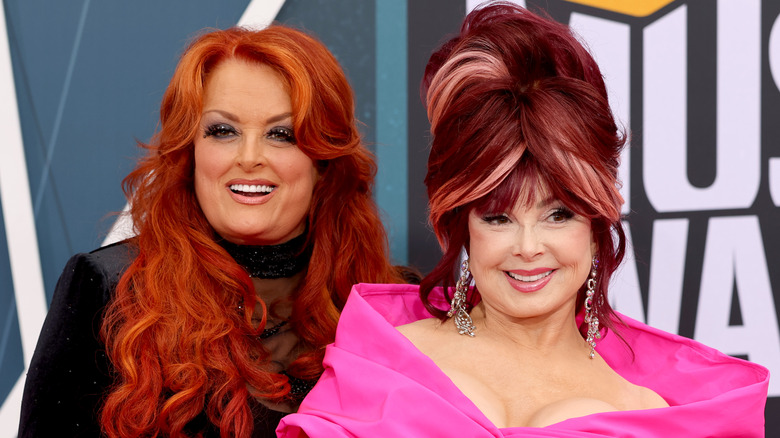 Wynonna and Naomi Judd posing