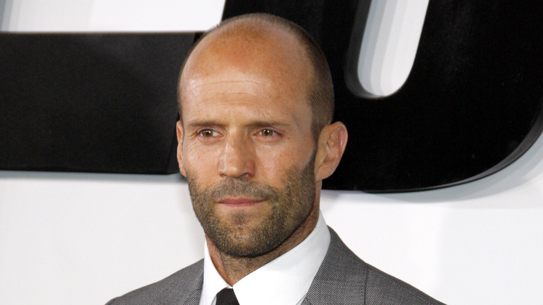 Jason Statham, half smile