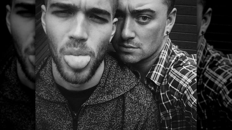 Jonathan Zeizel and Sam Smith pose close together