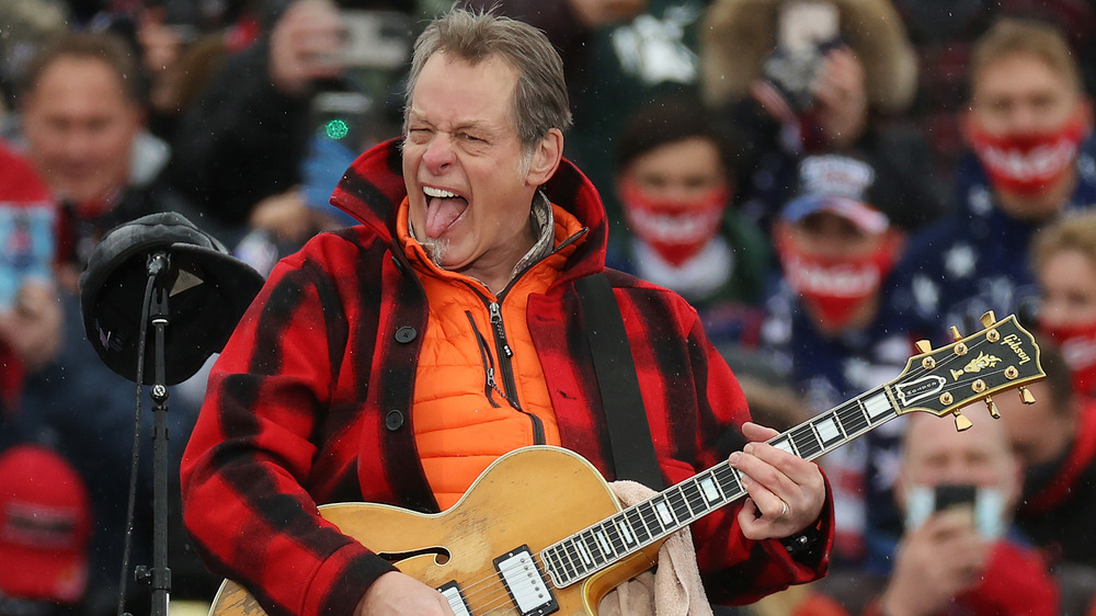 Ted Nugent playing guitar