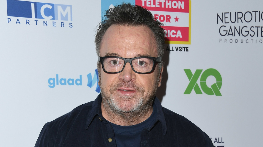 Tom Arnold posing