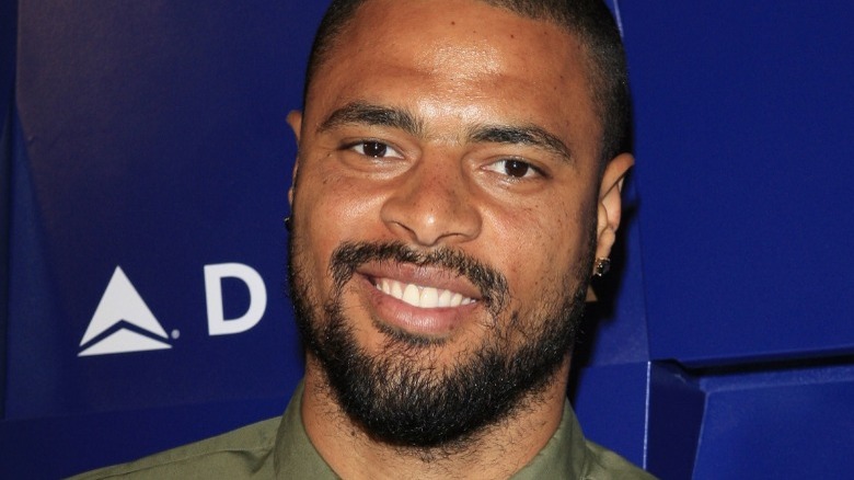 Tyson Chandler in front of a blue Delta backdrop