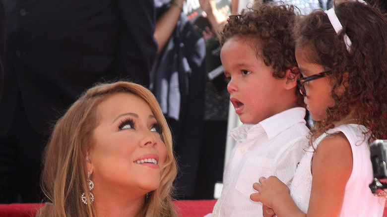 Mariah Carey looking up at Moroccan and Monroe