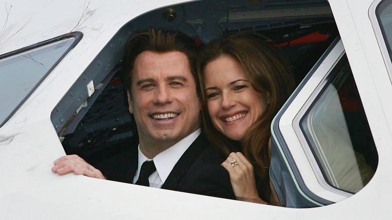 John Travolta and wife Kelly Preston in an airplane