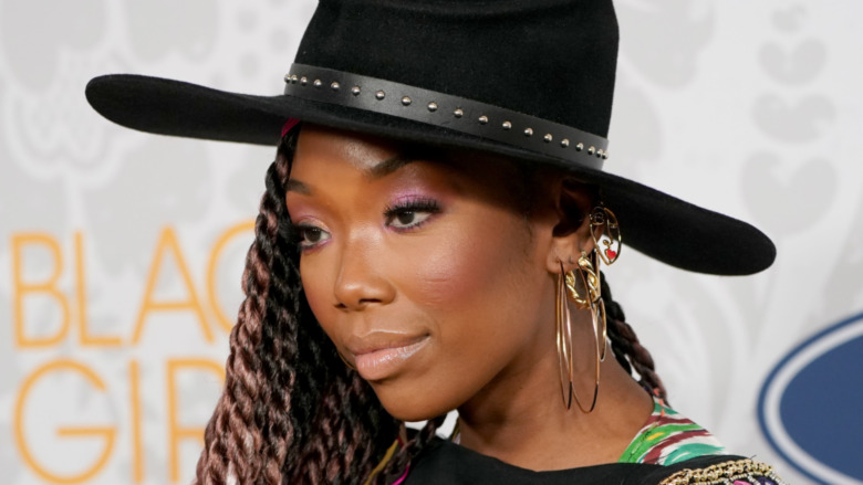 Brandy Norwood with a serious expression