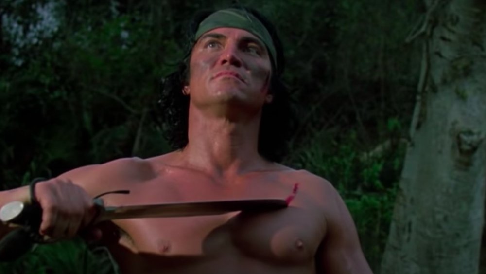 Sonny Landham cuts his chest on the set of Predator 