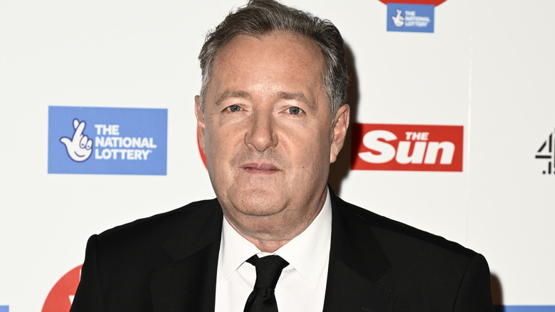 Piers Morgan, smirking