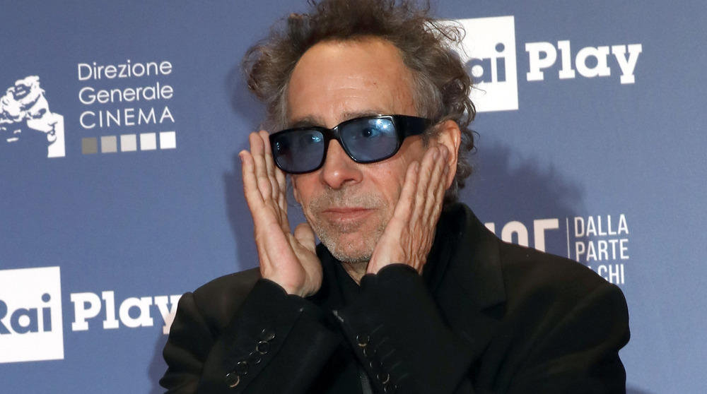 Tim Burton hands on sunglasses