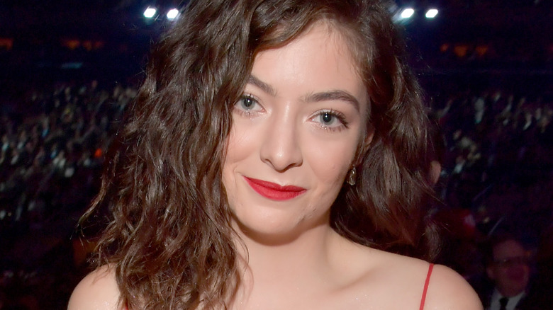 Lorde wearing red lipstick