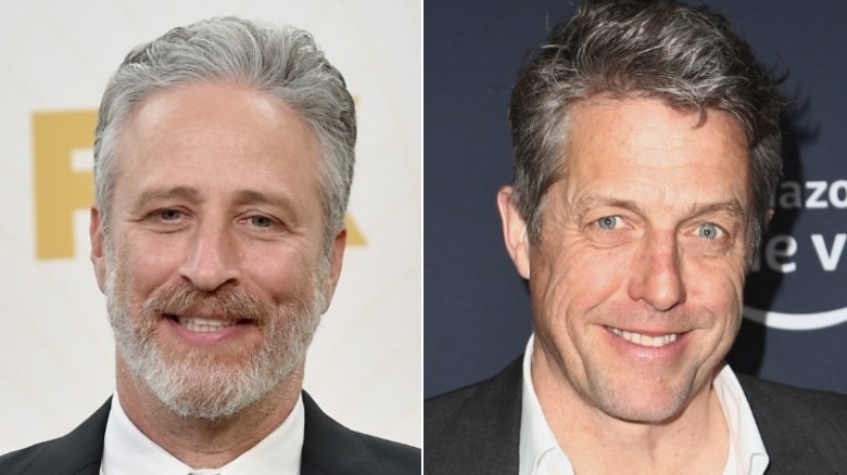 Jon Stewart smiling, Hugh Grant smiling