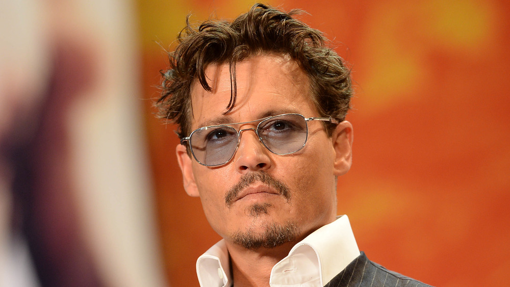 Johnny Depp in blue-tinted sunglasses