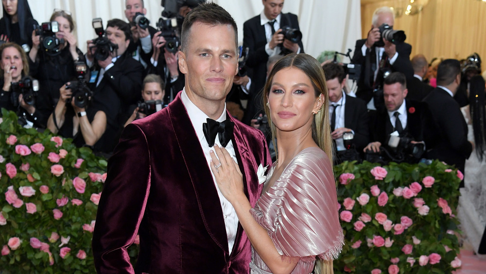 Tom Brady posing with Gisele Bundchen