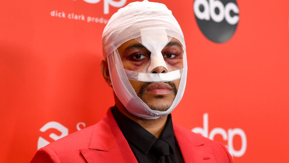 The Weeknd wearing bandages 