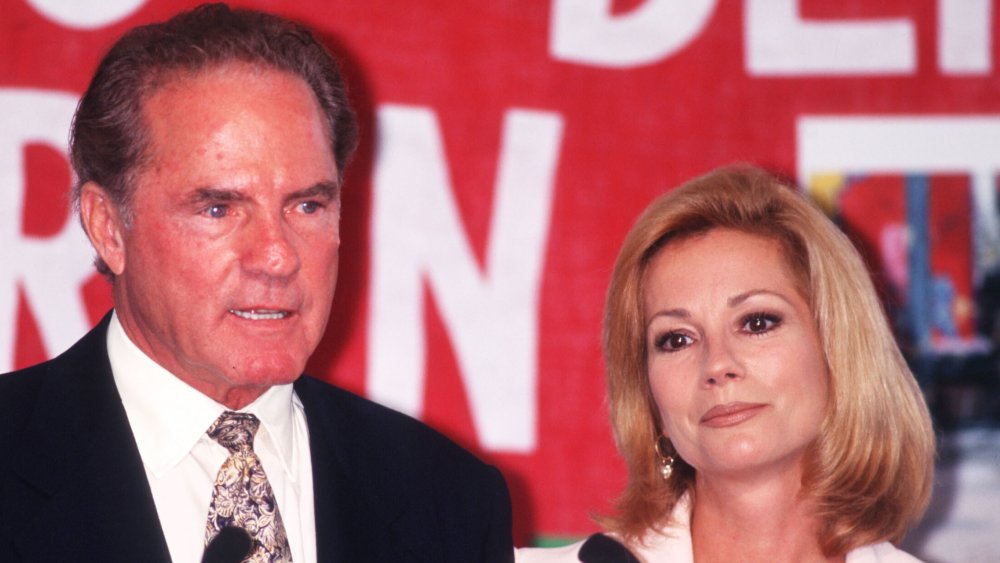 Frank Gifford and Kathie Lee Gifford speaking, both looking serious