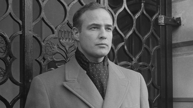 Marlon Brando posing outside