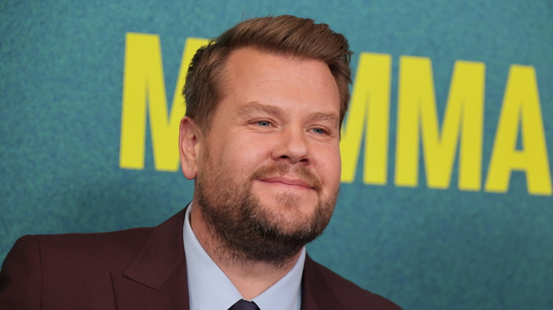 James Corden, smirking