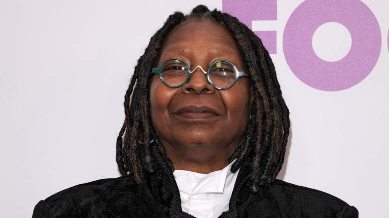 Whoopi Goldberg in blue glasses 