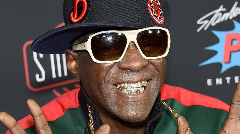 Flavor Flav grinning 