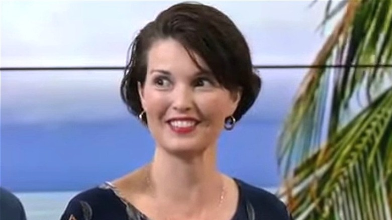 Angela Watson appearing on a news segment, smiling
