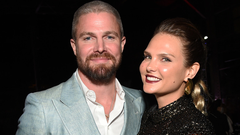 Stephen and Cassandra Jean Amell posing