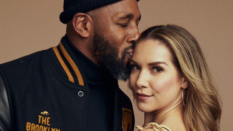 Stephen 'tWitch' Boss kissing Allison Holker