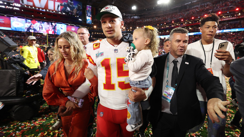 The Mahomes at a football game