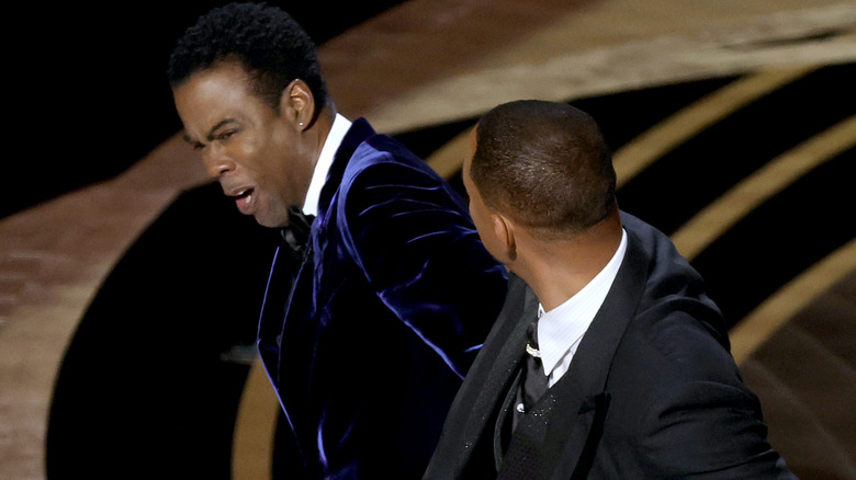 Will Smith appears to slap Chris Rock onstage during the 94th Annual Academy Awards