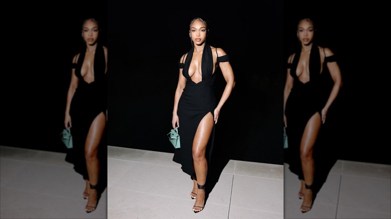 Lori Harvey in a sexy black dress