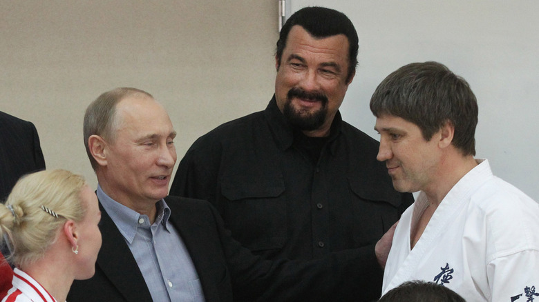 Steven Seagal smiling at Vladimir Putin