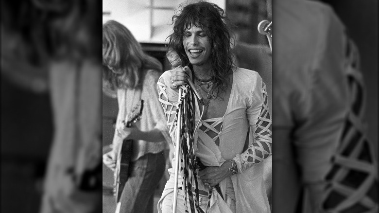 Steven Tyler mid-70s performance in lace-up jumpsuit