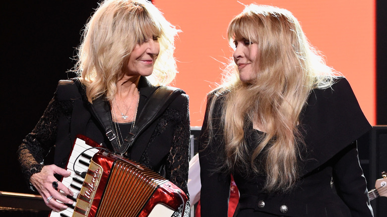 Christine McVie and Stevie Nicks performing