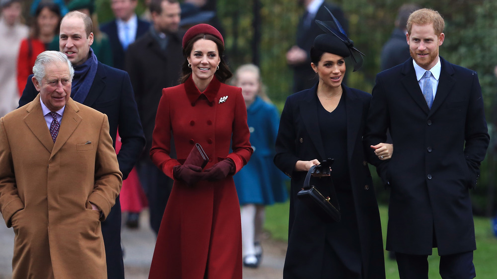 Prince Charles, Prince William, Kate Middleton, Meghan Markle, and Prince Harry attending a Christmas Day service