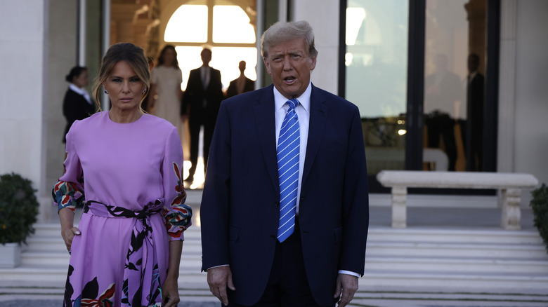 Melania, Donald Trump looking on