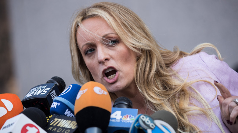 Stormy Daniels with microphones