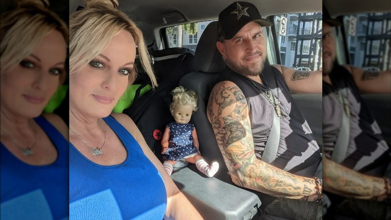 Stormy Daniels, Blade Barrett in car with doll