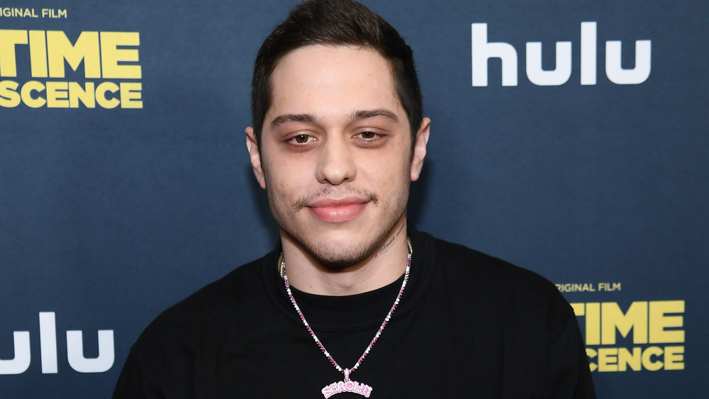 Pete Davidson smirking 