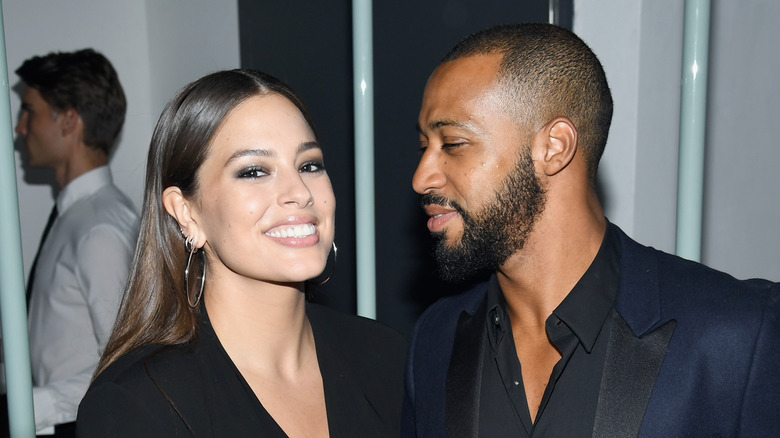 Ashley Graham smiling with Justin Ervin