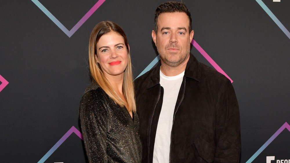 Siri Pinter smiling next to Carson Daly