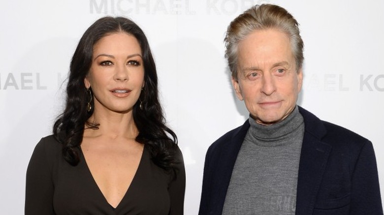 Catherine Zeta-Jones and Michael Douglas posing